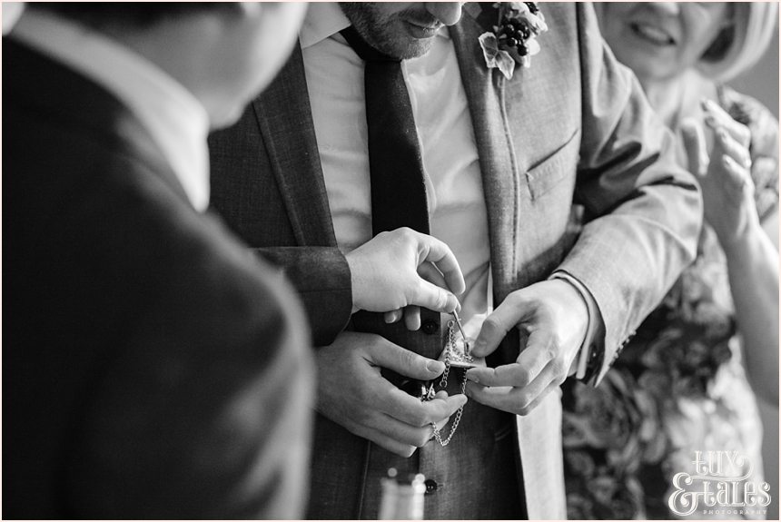 Heirloom watch being adjusted at hogarths hotel wedding