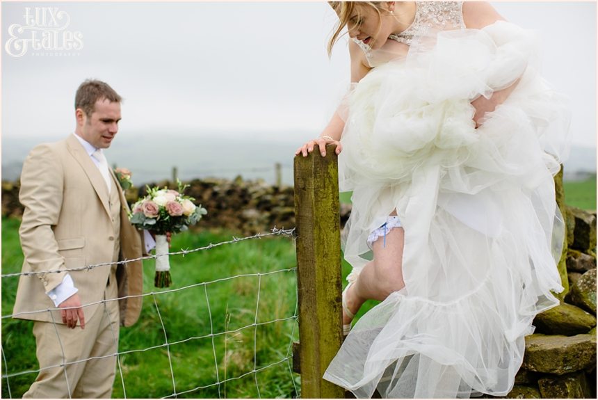 bride hops fence at Alma Inn