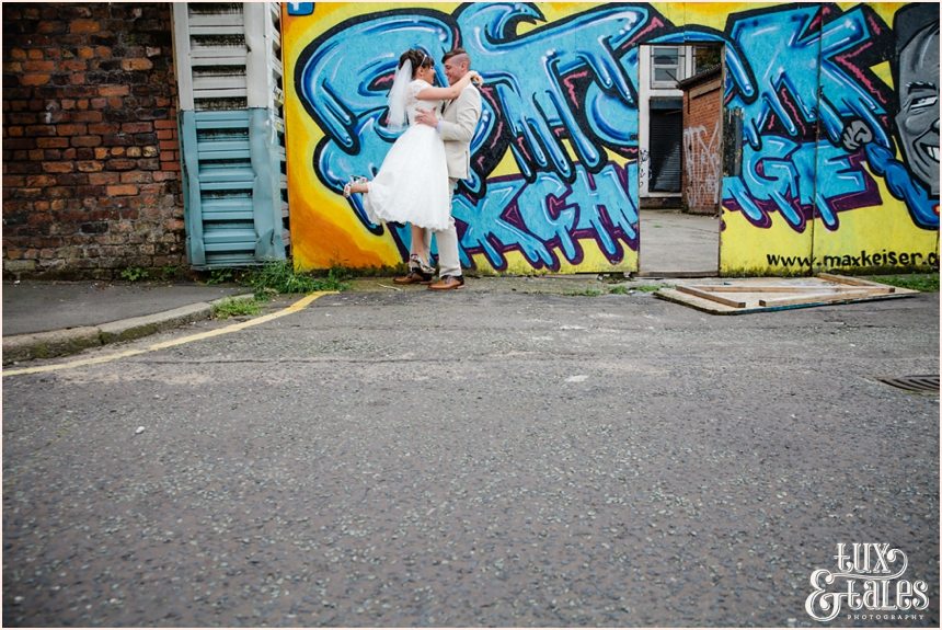 Bride & Groom in front of graffiti Camp & Furnace