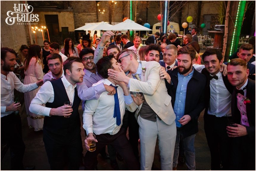 Groom smooch at Camp & Furnace Wedding photography
