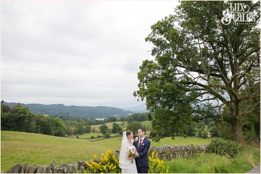Broadoaks Wedding Photographer Windermere || Tux & Tales Photography || Bride & groom portraits in the lake district mountains