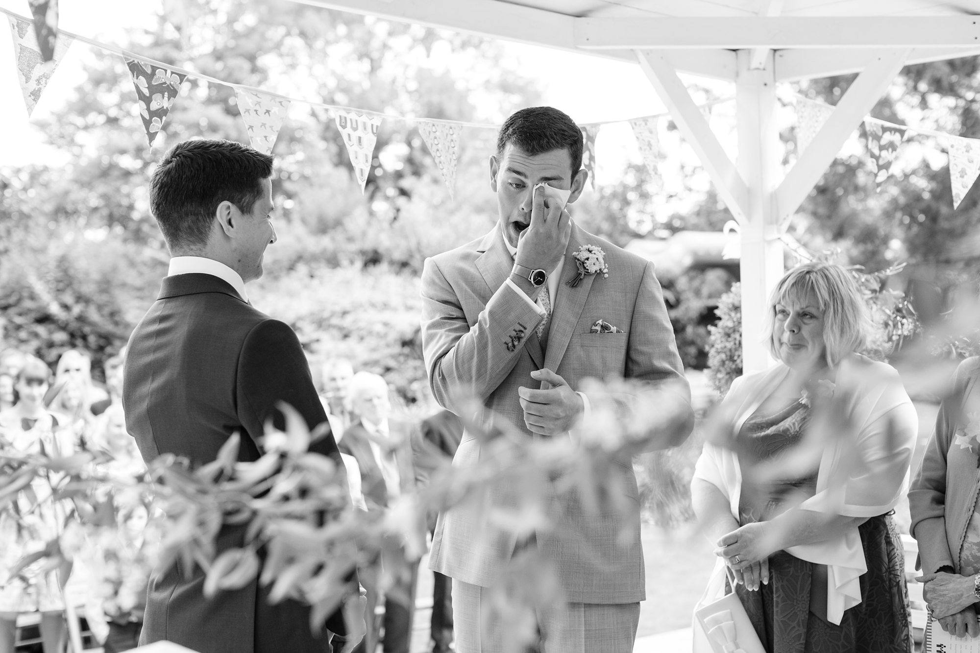 Groom wipes away tears