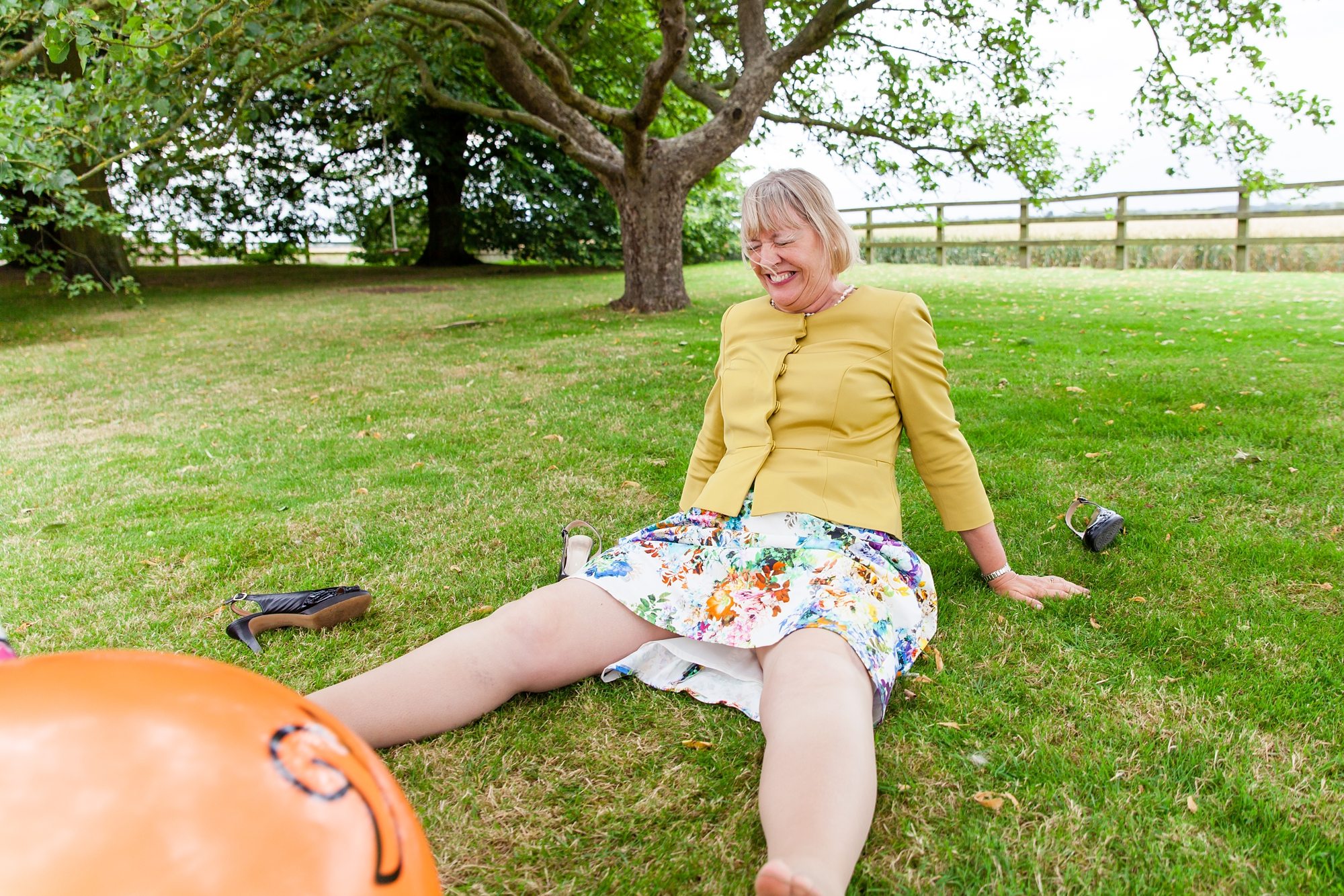 Wedding guest falling off spacehopper