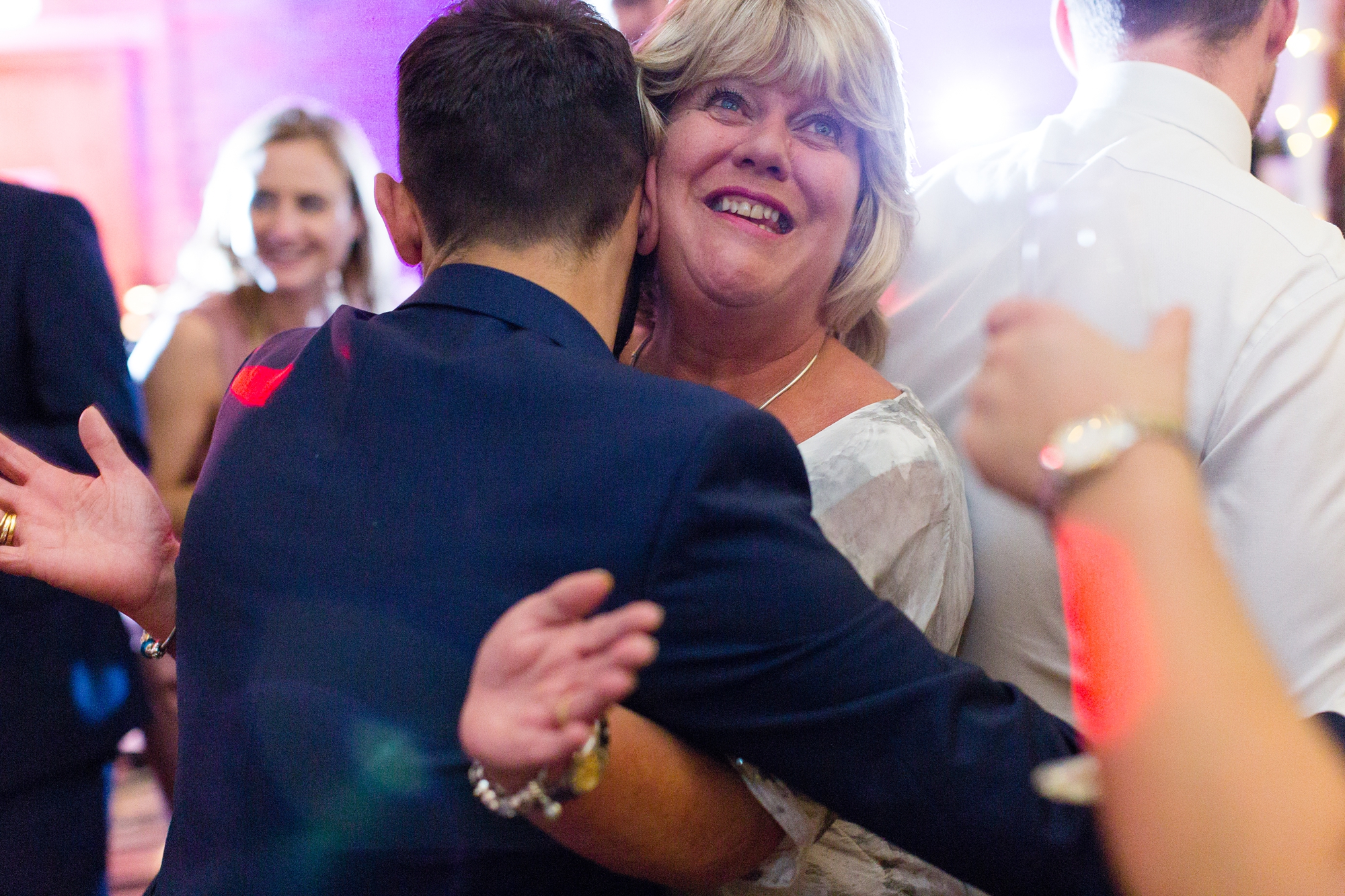 Dance floor party woman and man dancing at wedding