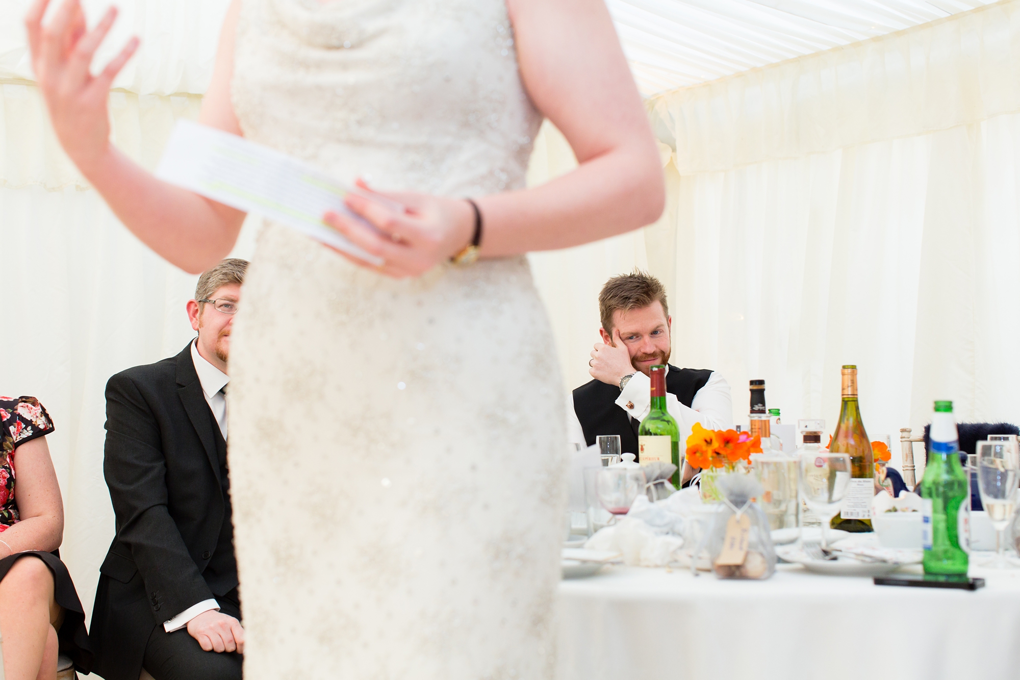 Groom cries whilst standing behind beide giving speech