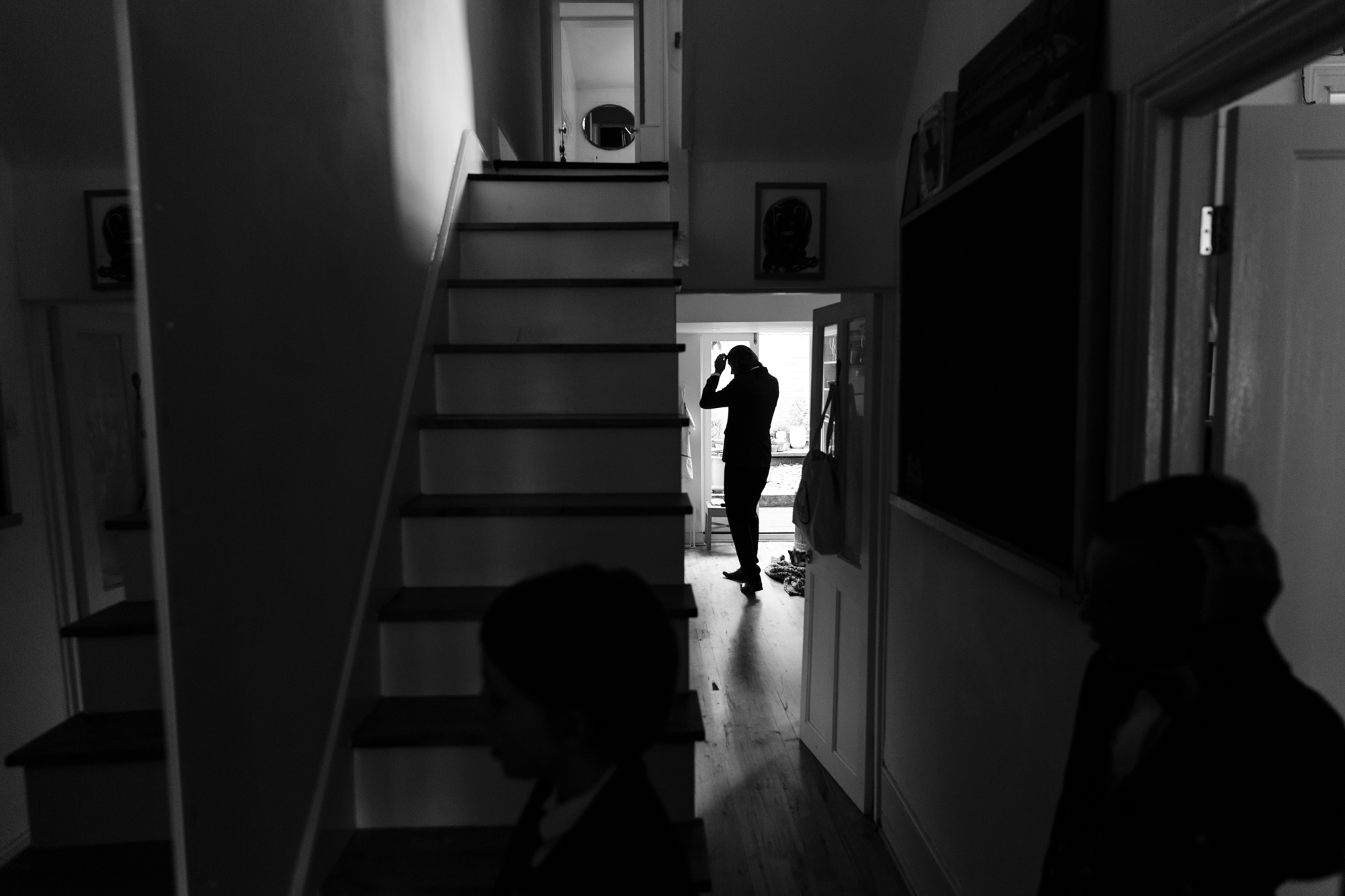 Silhouette of groom documentary wedding photograph