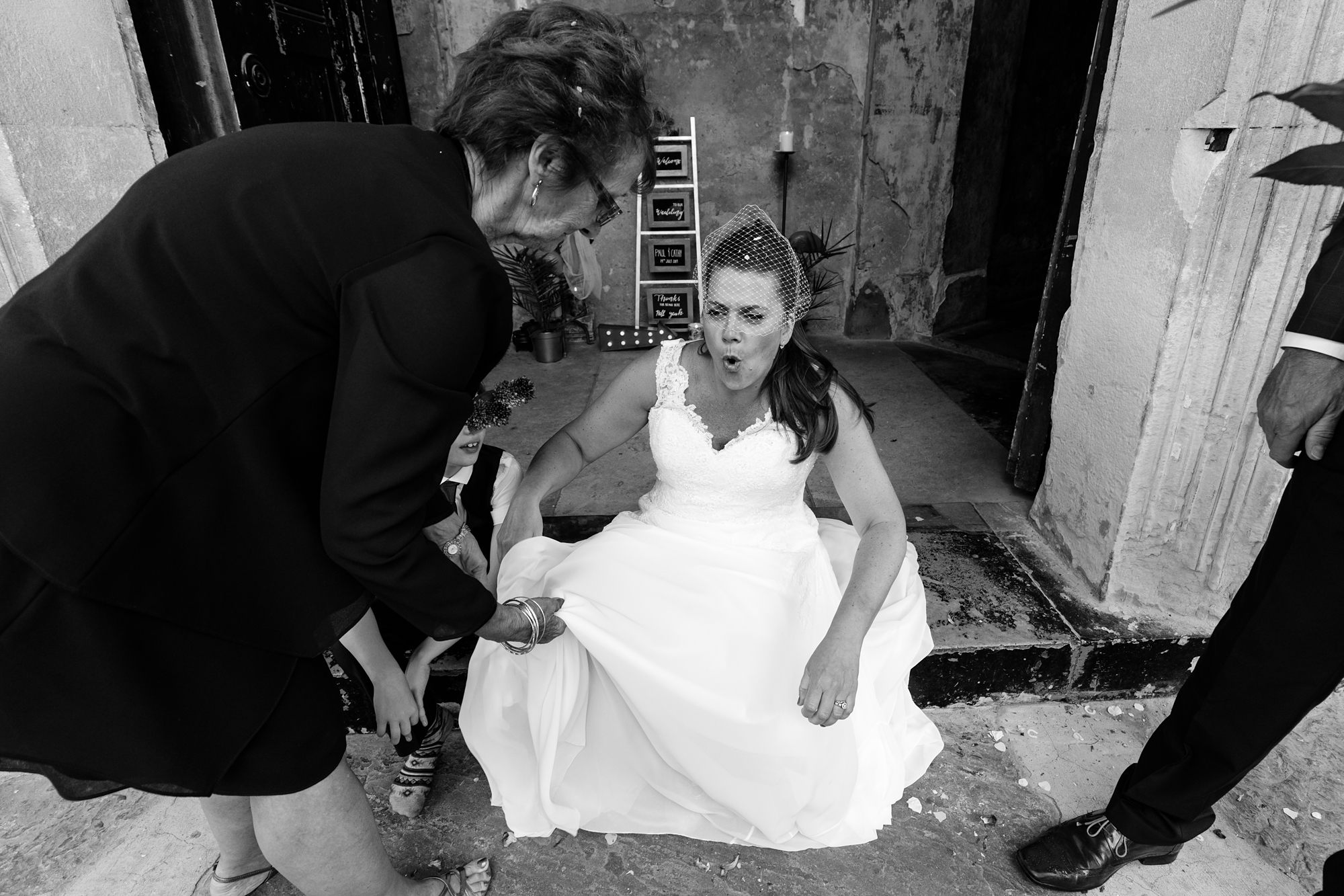 Bride sits down on step at Asylum in London