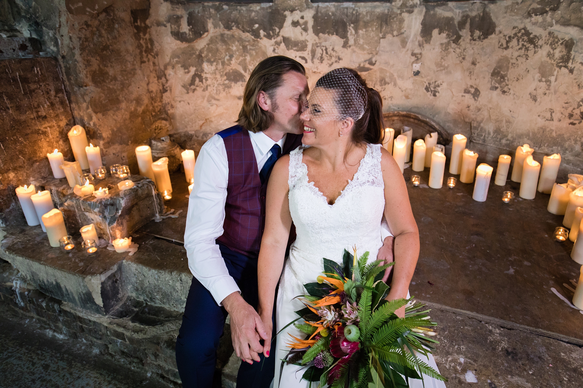 Quirky & Fun wedding photography by Tux & Tales Photography at Asylum in London lots of candles