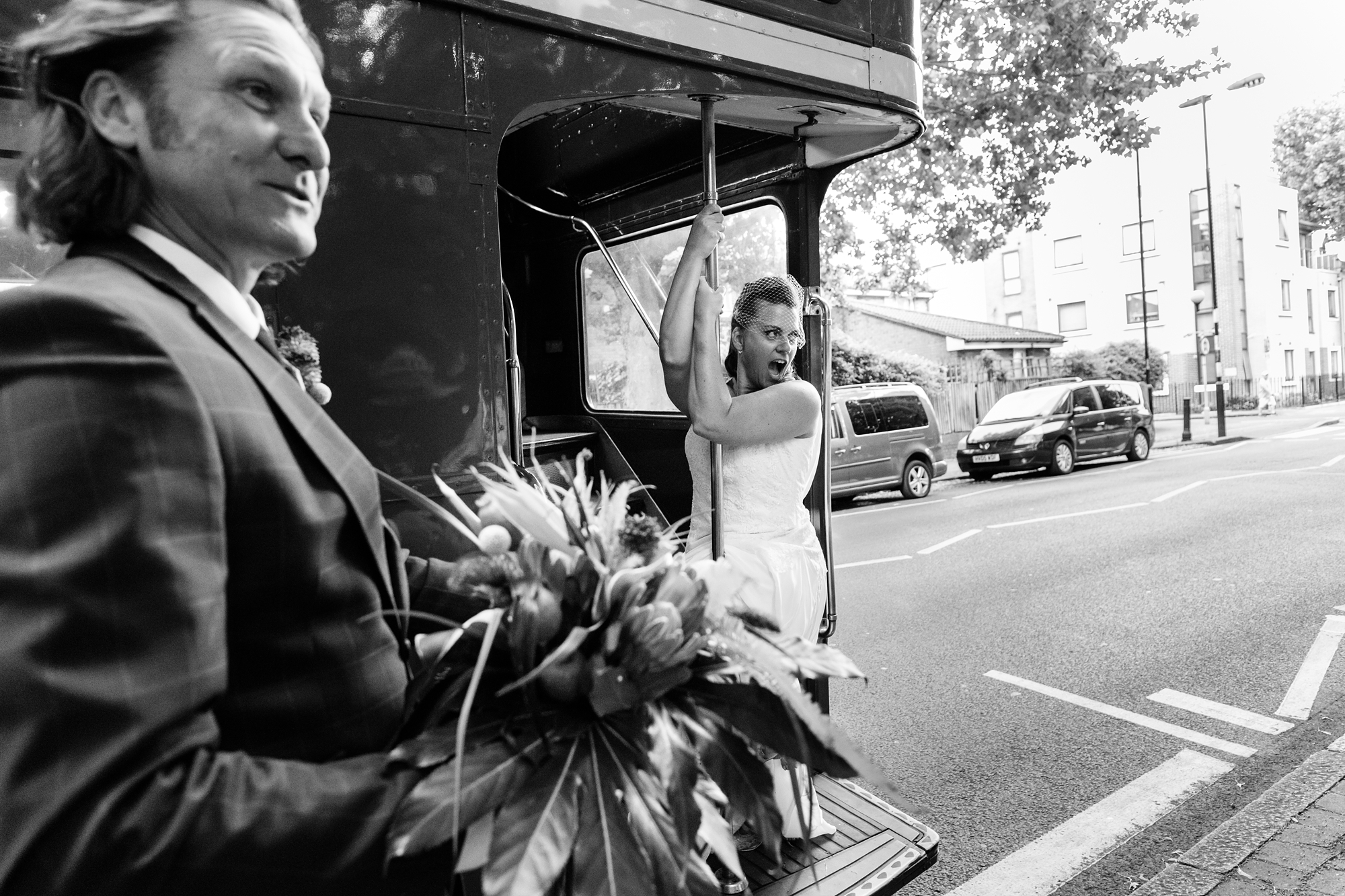 Bride pole dances on red London bus at quirky & fun wedding in London