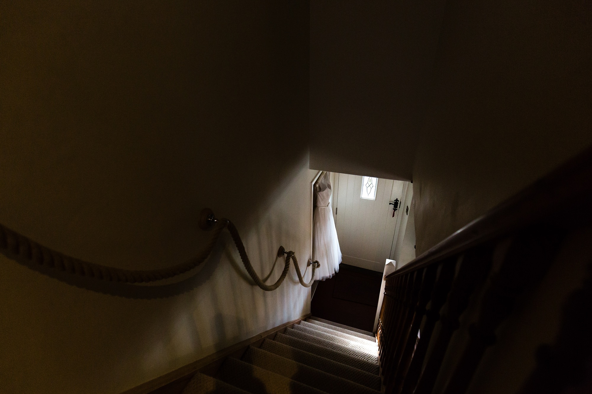 Sendburn Hall Wedding Photography bride's dress in a bram of light