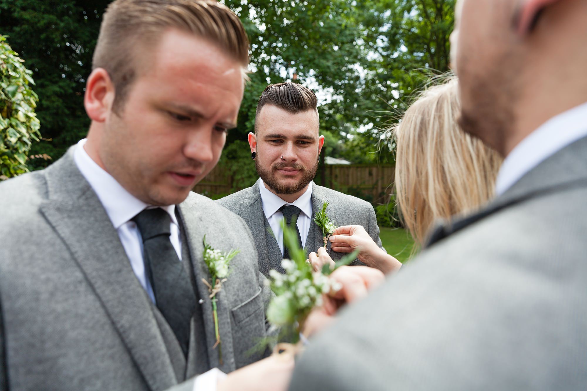 Putting on buttonholes