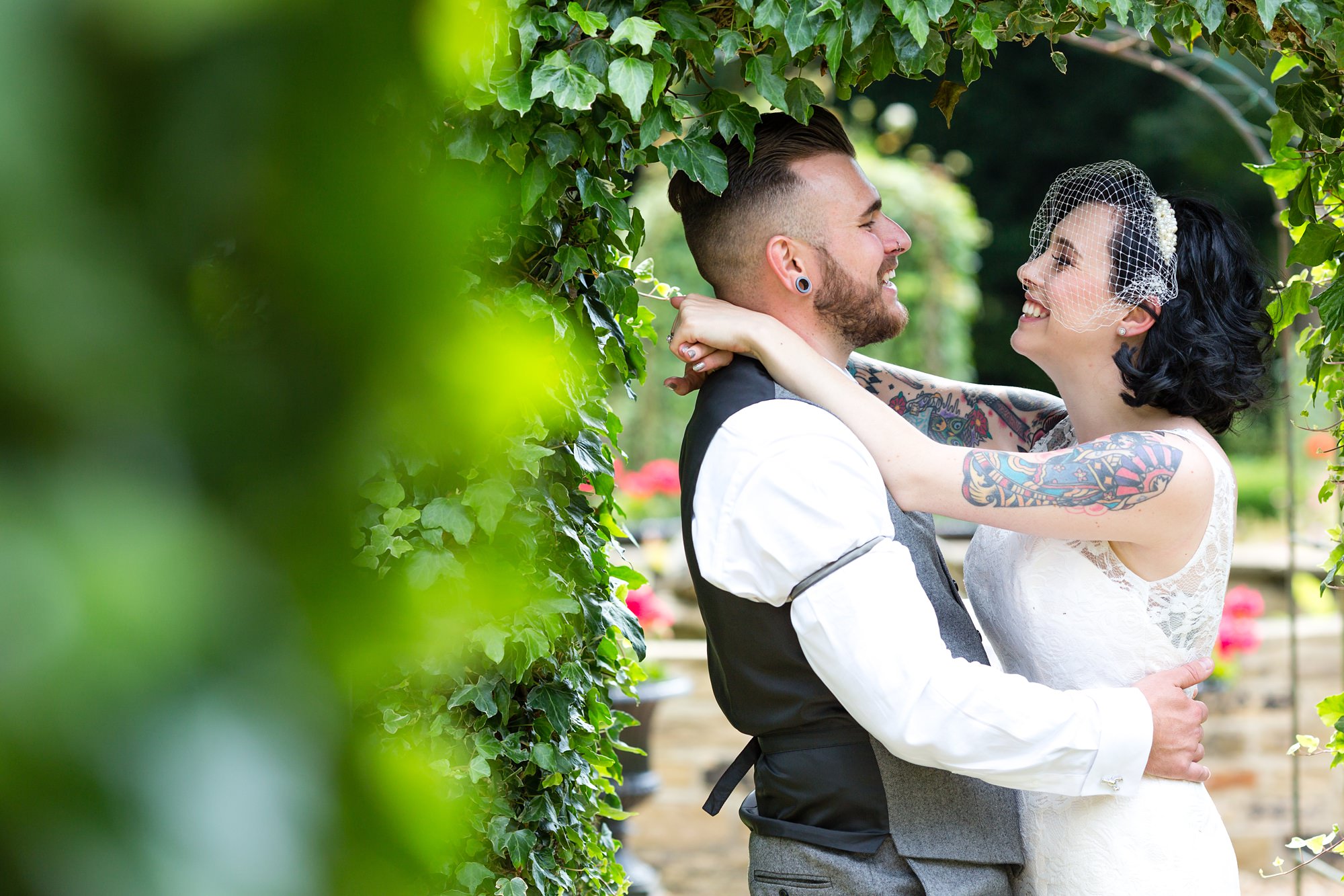 Tattooed bride and groom at Crab and Lobster wedding
