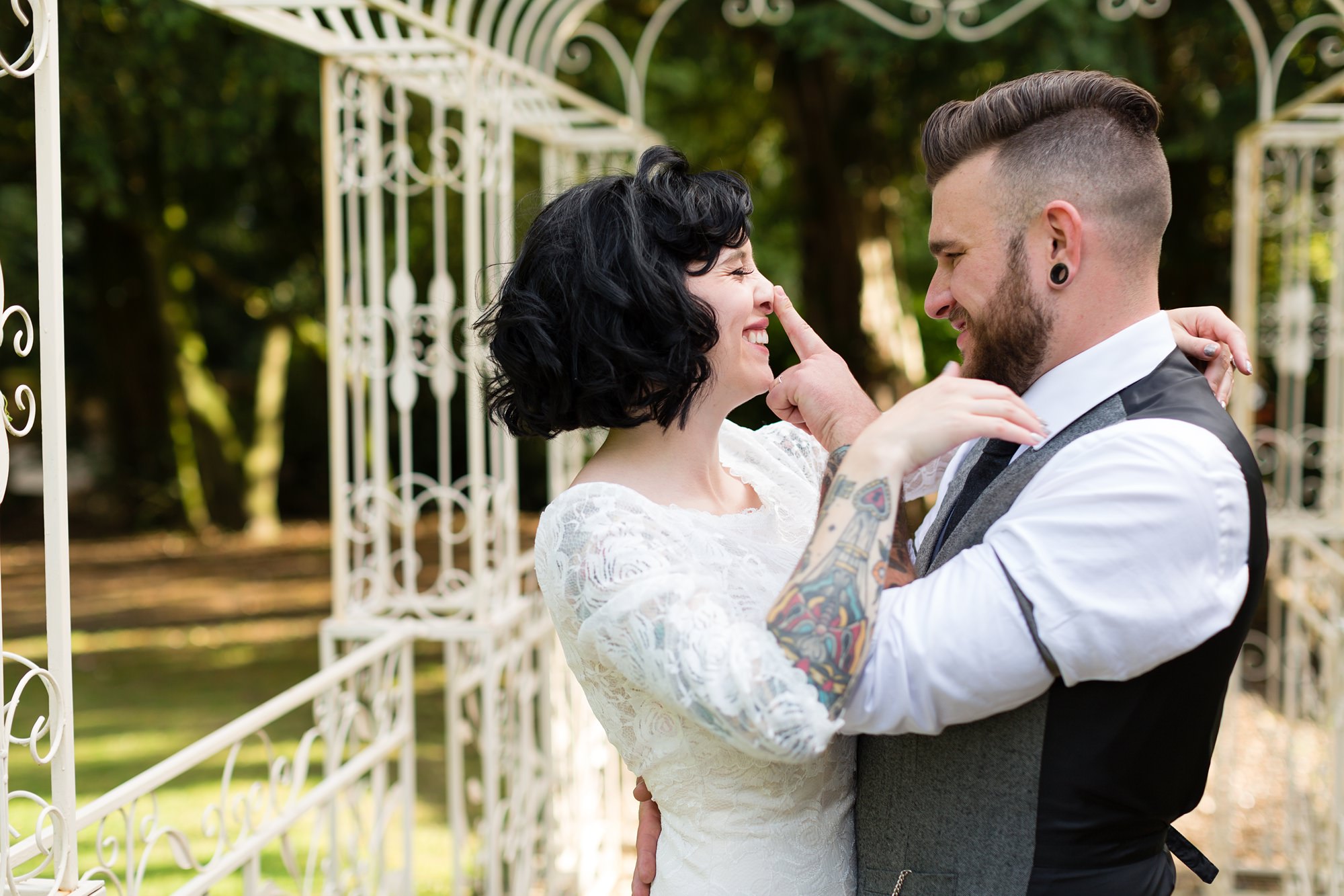 Couple make silly faces during couples portraits